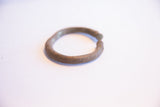 A simple, open-ended vintage African cuff with a rope-like carved texture.