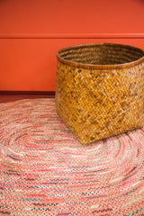 Woven pattern and sturdy base of the gigantic antique Asian bamboo basket.