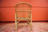 Mid Century Modern natural rattan chair, full slatted back.