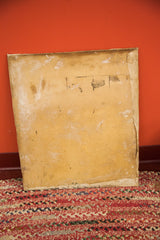 Salvatore Aucello painting reverse, aged light brown canvas back with chippy texture and faint markings.