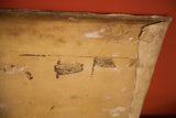 Worn corner of vintage painting, with 'SA' artist initials.
