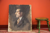 Vintage Aucello oil painting on board featuring a dark, ominous man's profile.