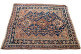 Antique Afshar rug: blue field, triple medallions, chestnut earth tones, 3'9