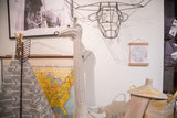 Mini Moon Chart art print in ballerina pink shown hanging on a wall for scale and context.