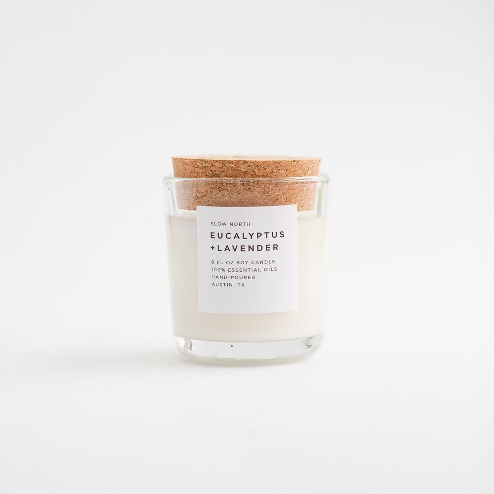 Eucalyptus and Lavender Soy Candle in a clear glass tumbler with a natural cork lid.