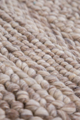 Chunky, hand-woven texture of natural undyed pure wool from the Birdie New Carpet Collection.