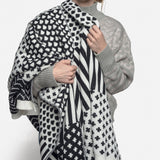 Modern handmade black and white blanket with diverse knit patterns, wool blend, 60x70.