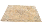 Faded vintage Oushak carpet, pastel earth-tones, central medallion, unusual mint-green spandrels.