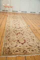 Egyptian rug runner shown at an angle, displaying its full length and intricate Sultanabad design.