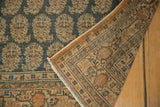 Reverse of antique Tabriz rug, displaying older adhesive signs and its woven foundation.