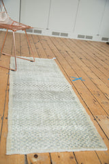Distressed Oushak rug runner with diminutive checker motif and textured pile.