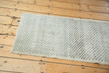 Vintage distressed Oushak runner showing checker motif and distinct dye lot variations.