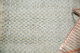 Distressed diminutive checker motif with ivory and oxidized silver tones.