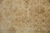 Distressed Amritsar rug with very low pile, visible split, and muted Herati pattern.