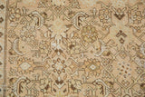 Texture of a distressed Malayer rug showing even wear to the knot heads and visible foundation threads.