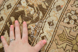 Hand-knotted pile worn to the foundation on a vintage distressed Malayer carpet.