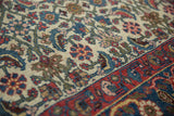 Intricate Herati motif on ivory ground with madder red border, Vintage Persian Halvai Bijar rug.