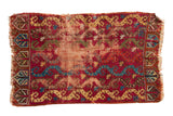 Worn raspberry red antique Yastik rug, sapphire blue vines, saffron yellow motifs, 1'7