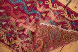 Antique Yastik rug detail with exposed foundation and germinating plant motif on the reverse.