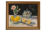Grace B. Keogh still life painting: yellow lemons, pink flower, silver dish, ornate gold frame.
