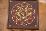 Original dot painting on vintage end table top with cream, yellow, and burgundy colors.