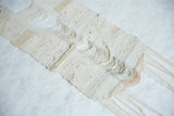 Handmade Lea Thomas Magnolia Weaving: organic contours, varied textures, and natural hand-dyed fibers.