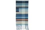 Lea Thomas hand-dyed weaving with abstract blue, grey, and terracotta color blocks and fringe.