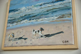 Close-up of GBK signature and a black and white dog on the beach painting.