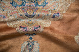 Ornate Rococo-style pattern detail with distressed pile in blues, pink, and sandalwood.