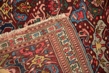 Antique Seichor Kuba rug border featuring geometric patterns, vibrant hues, and tattered fringe.
