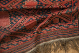Thick pile Beshir rug: madder red, navy gul medallions, original striped plain weave, natural fringe.