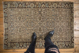 Antique Distressed Farahan Sarouk rug, even wear shows faint foundation, ivory and blue florals.