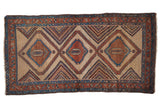 Antique Camel Hair Serab rug with three serrated diamond medallions in shades of copper, sky blue, and brown.