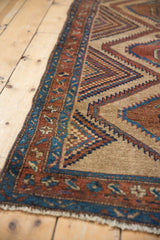 Close view of the intricate border and original side cord selvage on a hand-knotted Serab rug.