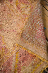 Distressed angora wool pile with exposed knot heads and hand-knotted foundation.