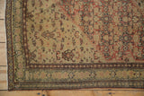 Intricate corner spandrel and border detail on a fine antique Senneh with time-softened wear.