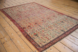 Fine weave of antique Persian Zuli Sultan rug, with allover germinating floral motifs in ivory and blush.