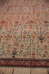 Fine wool antique Zuli Sultan rug displays dense germinating plants and floral blossoms.