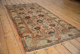 Vintage Mehreban rug end, white fringe, and curvilinear William Morris style border in slate, rose.