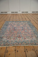 Vintage Kerman rug, circa 1940s, displaying allover millefleur in blush, sky blue, and ivory.