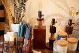 Made in USA Edison lamp with solid oak base, hand-twisted copper coils, and vintage bulb.