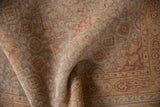 Folded vintage Amritsar runner texture, even pile wear, faint foundation, and muted earth tones.