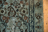 Distressed Meshed carpet detail, dusty blue, indigo, blush floral-boteh pattern, border, worn pile.
