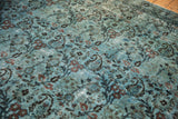 Distressed vintage Meshed carpet texture, with dusty blue and blush Arts and crafts motifs.