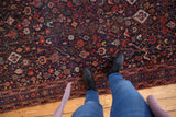 Vintage Shiraz runner with allover forest scene, plants, animals in navy, red, saffron.