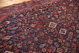 Elaborate geometric bird and animal motifs in navy, red, and ivory on vintage Shiraz rug.