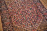 Antique Malayer rug's unusual deep saffron spandrel with starburst and navy Samovar Turtle border.