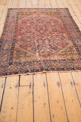 Antique Malayer rug: worn fringe and navy blue Samovar Turtle design border detail.