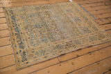 Distressed Meshed rug with gold field, blue tree of life motifs, showing overall wear.