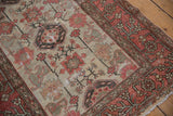 Softened vintage Hamadan rug pile with terracotta guls, geometric arabesques, and vine border.